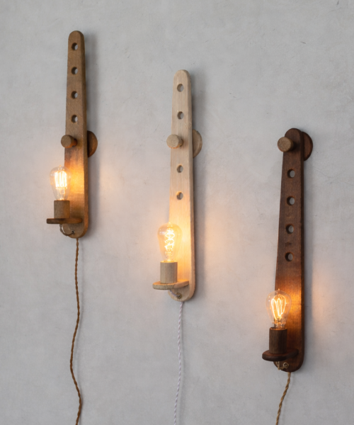 Copy of Wooden sconces on textured wall